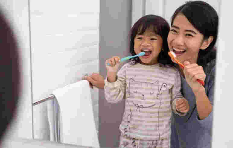 How can I encourage my kids to brush their teeth?
